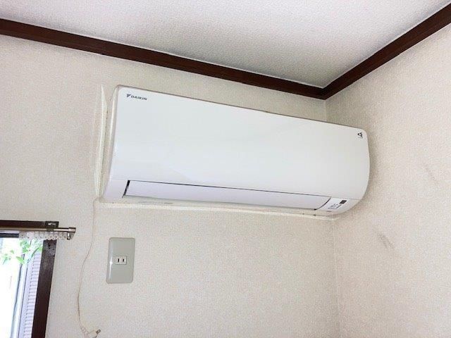y̑ݔz@